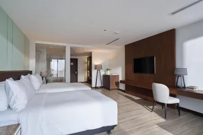 Twin Room with City View — Grand Signature by M Village Lê Thánh Tôn, a brand of Modern Village Lifestyle